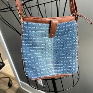 The Sak Blue Denim and Crochet Crossbody Bag Purse